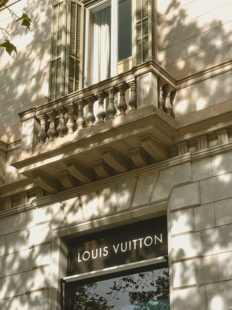 The iconic Louis Vuitton store on Passeig de Gràcia in the Eixample district, a hallmark of the luxury that can help you find your ideal neighborhood in Barcelona.